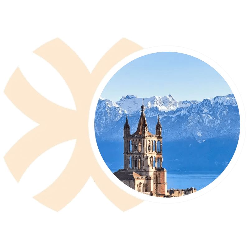 Logotipo de Eldi con paisaje de Lausana, Suiza, destacando un castillo antiguo y montañas, en color azul.